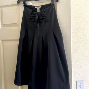 Black H&M skirt size 2, brand new with tags.